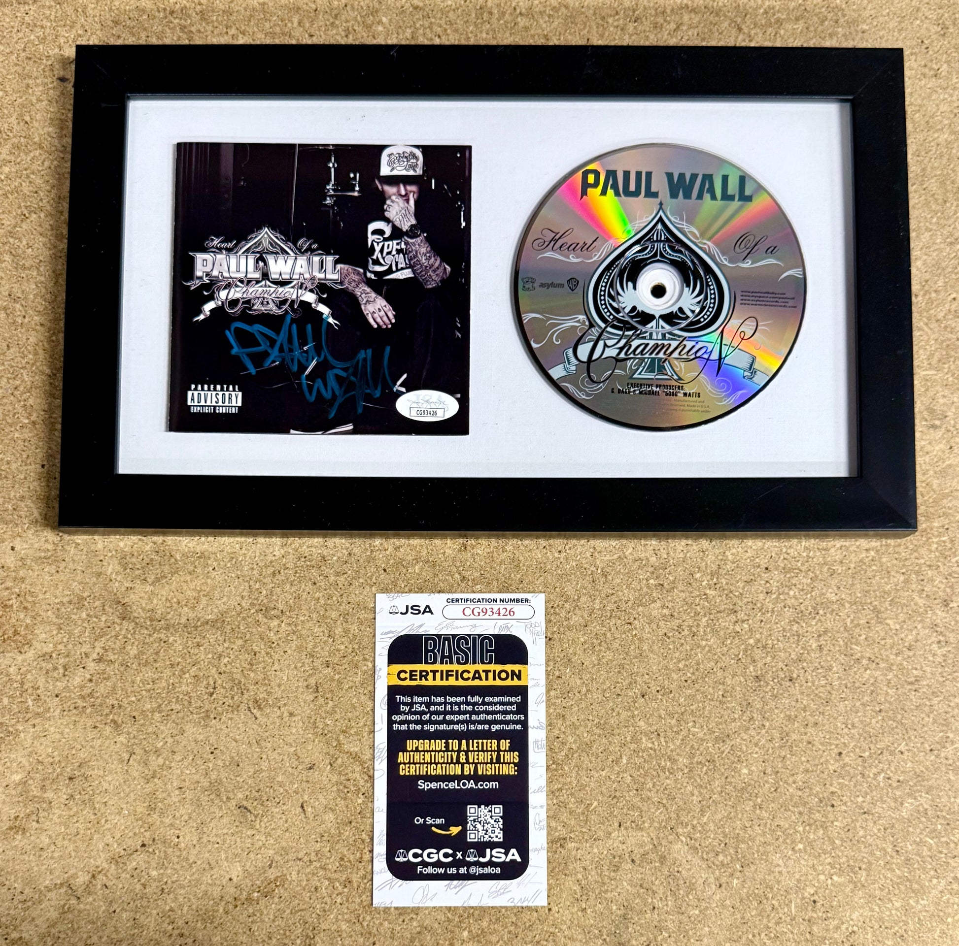 Rapper Paul Wall Signed “Heart Of A Champion” (2010) Framed CD With JSA COA
