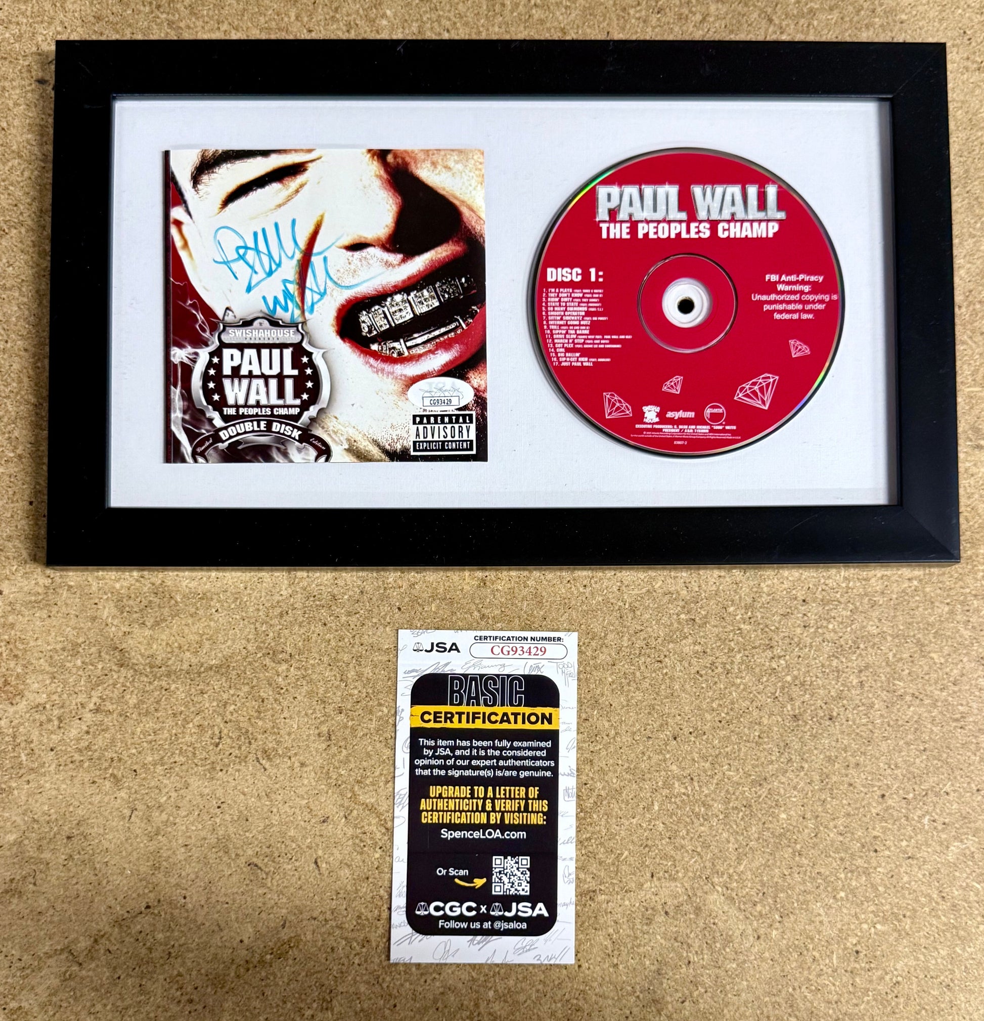 Rapper Paul Wall Signed “The People’s Champ” (2005) Framed CD With JSA COA